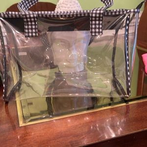 See through bag nice size with checker handles.